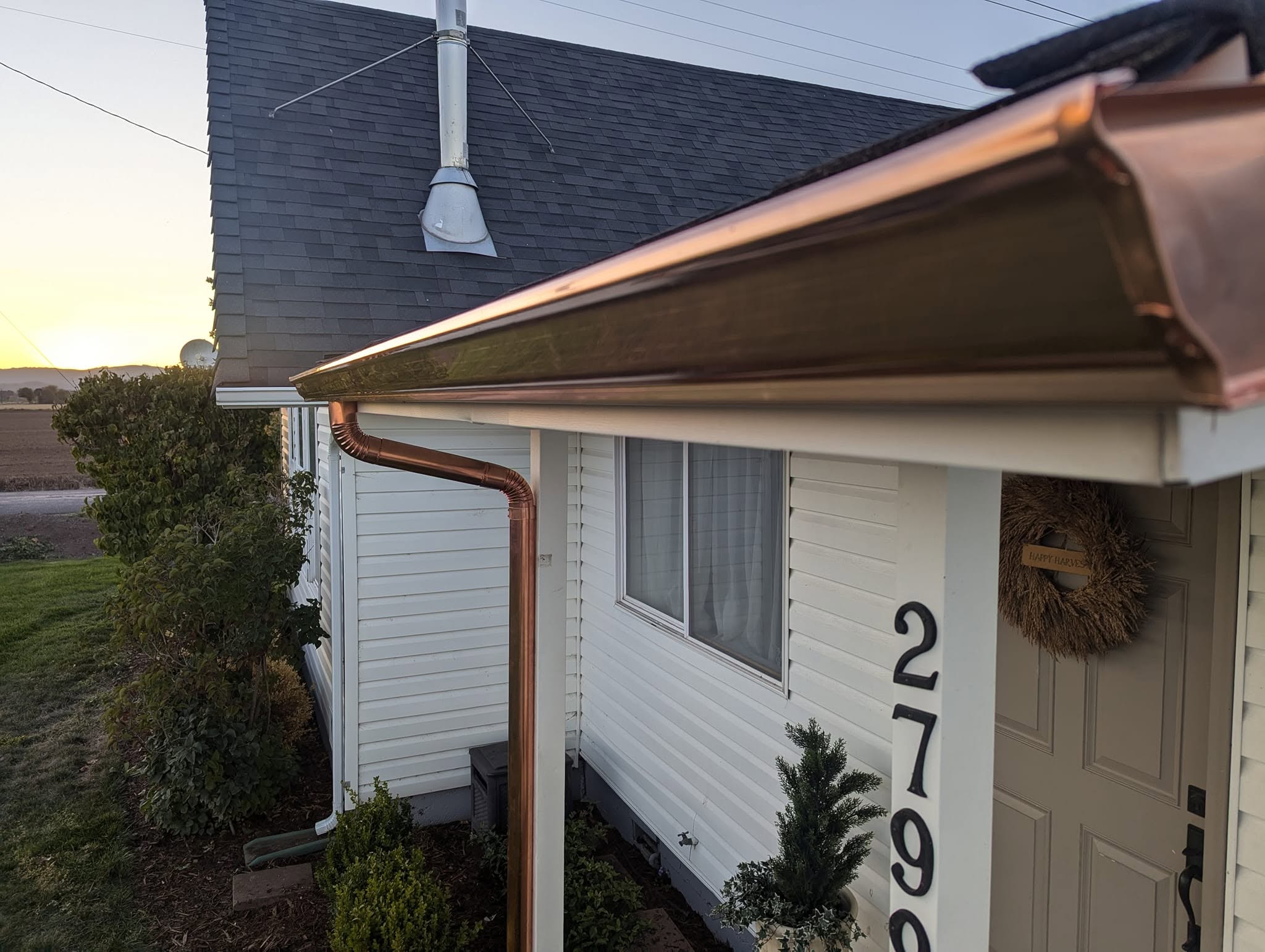 Seamless gutter installation on a Pacific Northwest home
